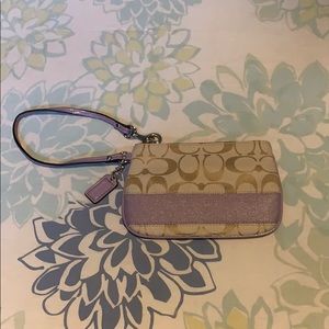 Coach Wristlet with purple stripe